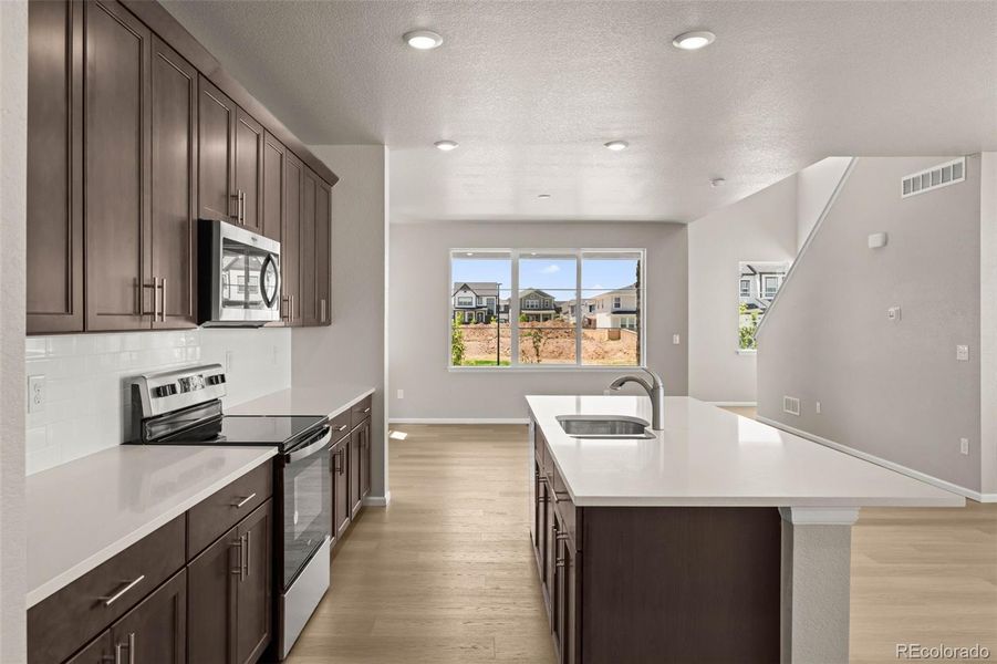 Furnished interior view inside a new home in Painted Prairie, Aurora (Image 19).
