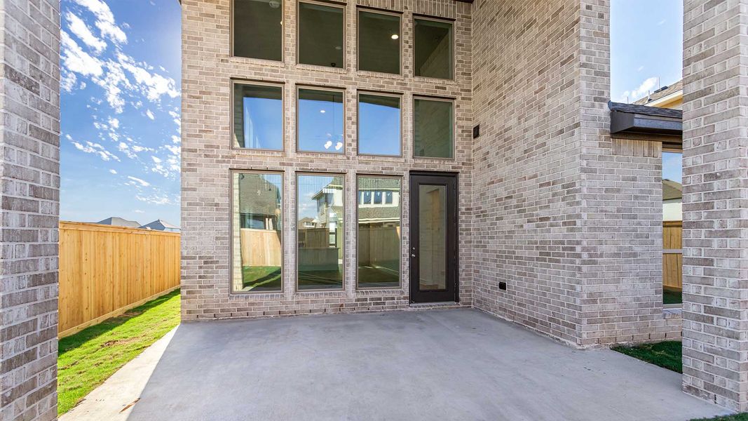 Exterior details and patio area of a home in Bridgeland, Cypress (Image 3).