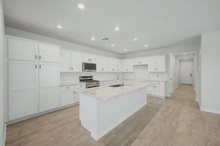 Furnished interior view inside a new home in Avanti at Granite Vista, Waddell (Image 8).