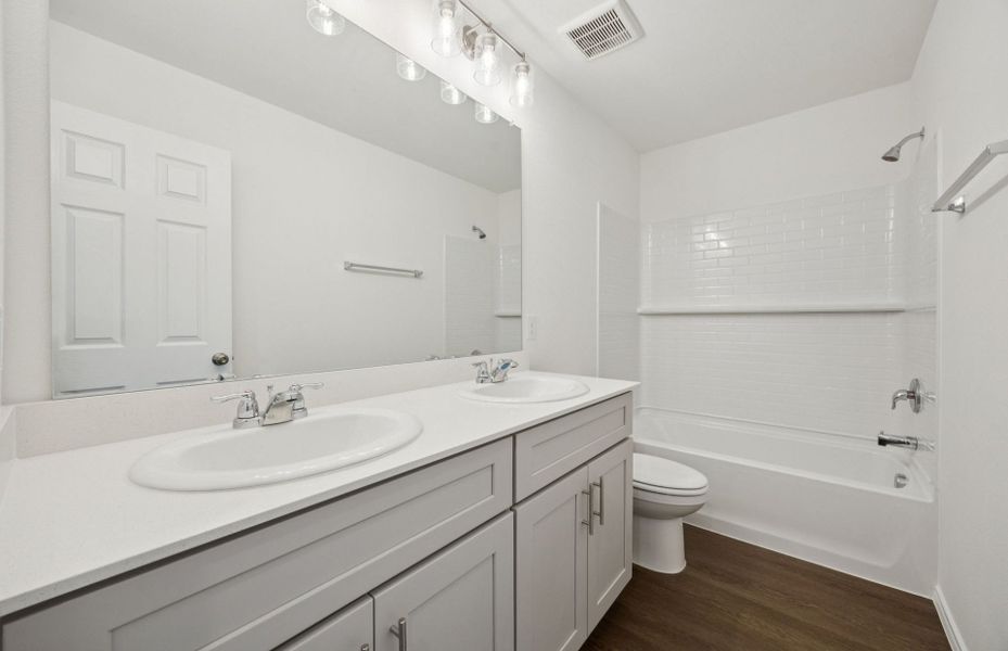 Representative furnished interior of a home built from the Camelia by Centex in Mobberly Farms, Pilot Point (Image 10).