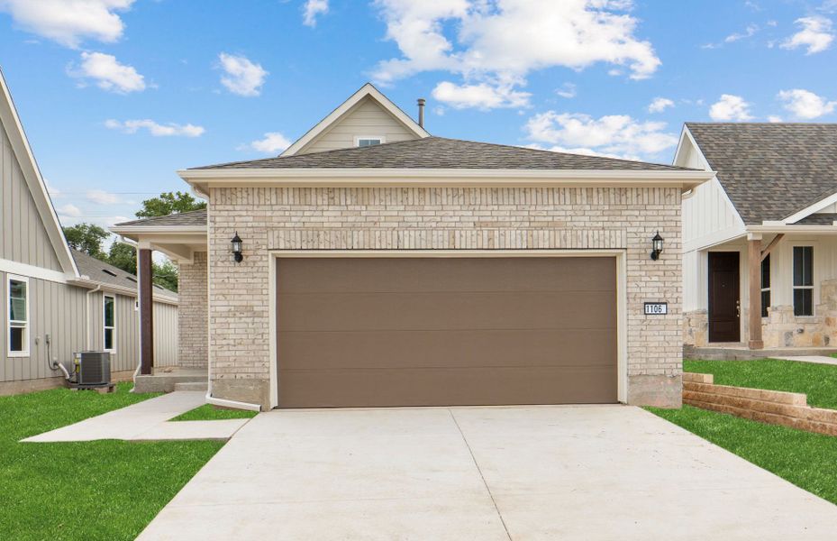 Front exterior of a new home in Sun City Texas, Georgetown, TX, highlighting curb appeal (Image 20).