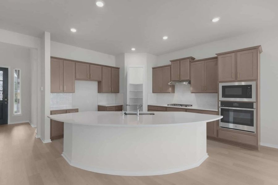 Representative furnished interior of a home built from the Madison by Chesmar Homes in University Heights, McKinney (Image 6).