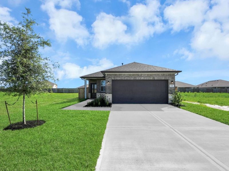 Front exterior of a new home in Emberly, Beasley, TX, highlighting curb appeal (Image 2). Front exterior of a new home in Emberly, Beasley, TX, highlighting curb appeal (Image 2).