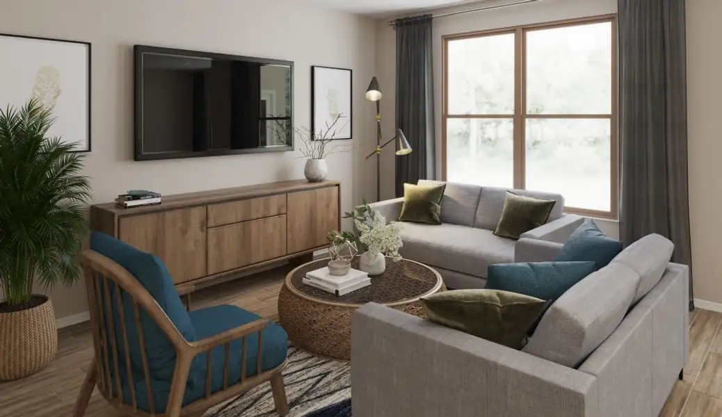 A living room with a couch and a table.