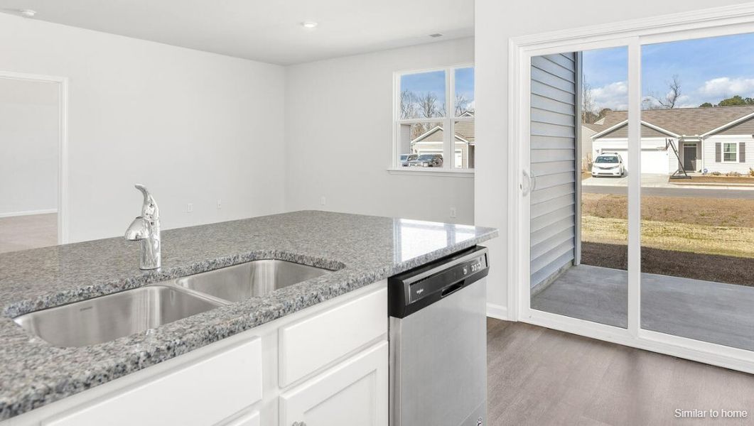 Furnished interior view inside a new home in Bella Point, Bolivia (Image 9).
