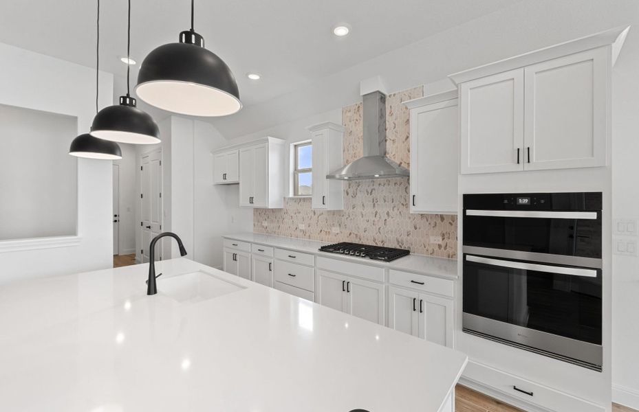 Furnished interior view inside a new home in Bluffview Reserve, Leander (Image 6).