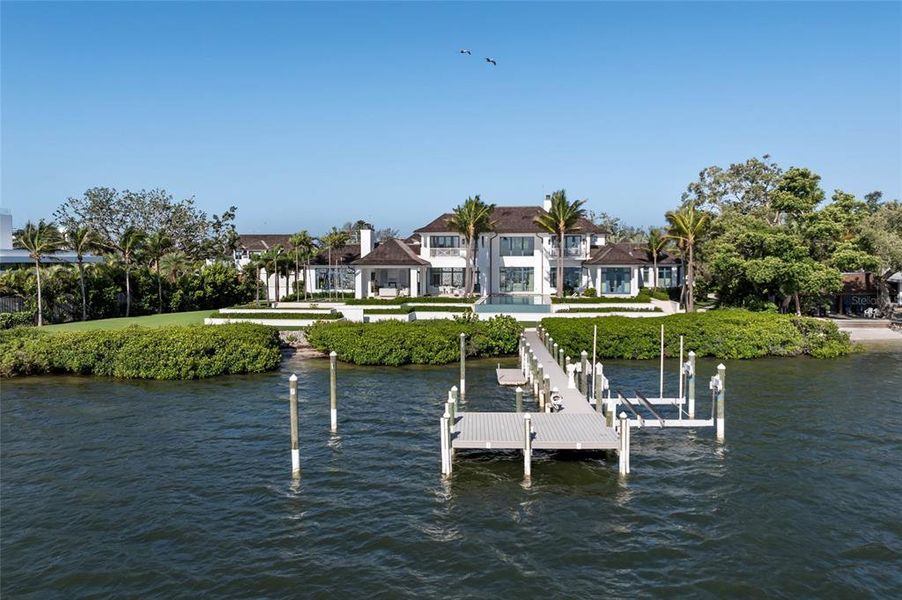 Front exterior of a new home in , Sarasota, FL, highlighting curb appeal (Image 24). Front exterior of a new home in , Sarasota, FL, highlighting curb appeal (Image 24).