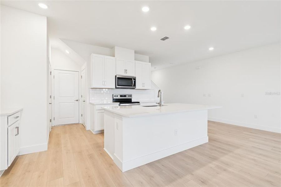 Furnished interior view inside a new home in North River Ranch – Townhomes, Parrish (Image 12).