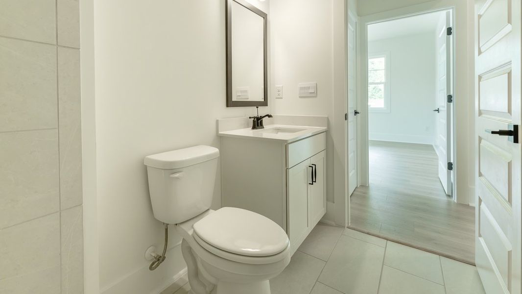 Representative furnished interior of a home built from the Hanover by D.R. Horton in The Village at Sandy Plains, Marietta (Image 3).