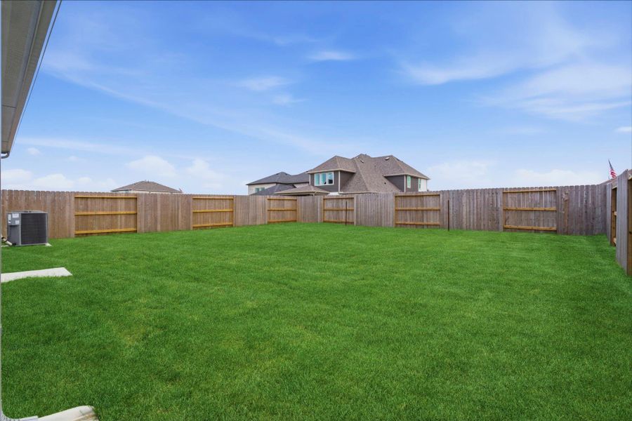 Exterior details and patio area of a home in Creekhaven, Iowa Colony (Image 3). Exterior details and patio area of a home in Creekhaven, Iowa Colony (Image 3).
