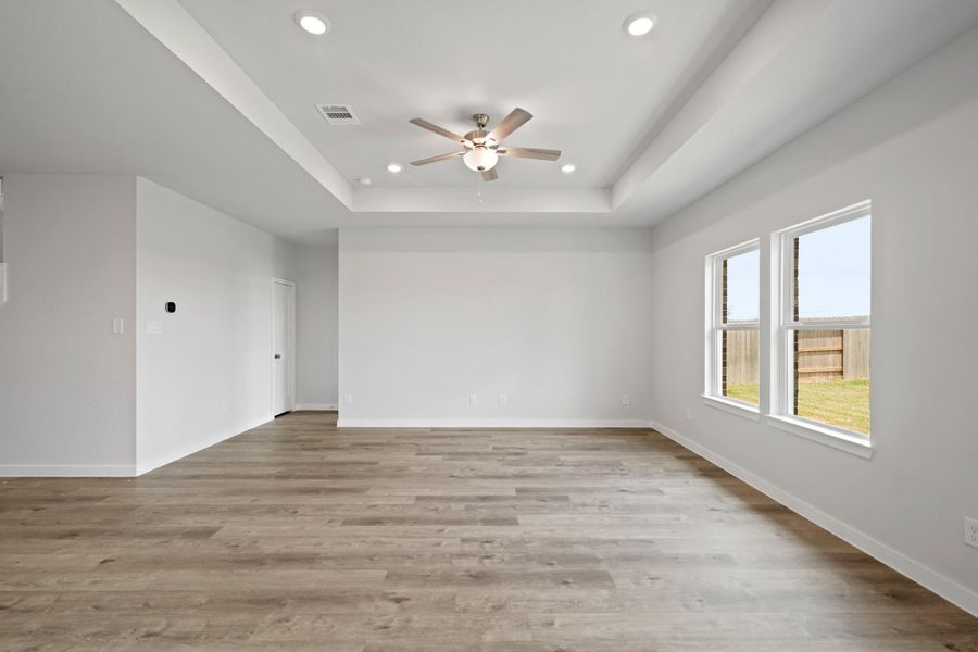 Spacious, unfurnished interior of a new home in Sunterra, Katy (Image 19).