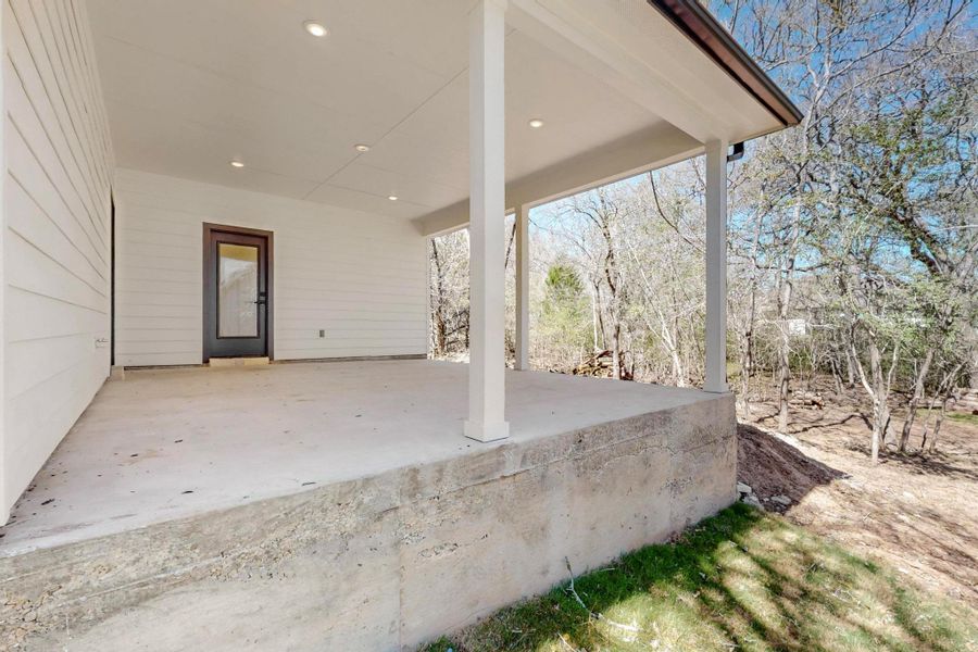 Exterior details and patio area of a home in , Bastrop (Image 15).