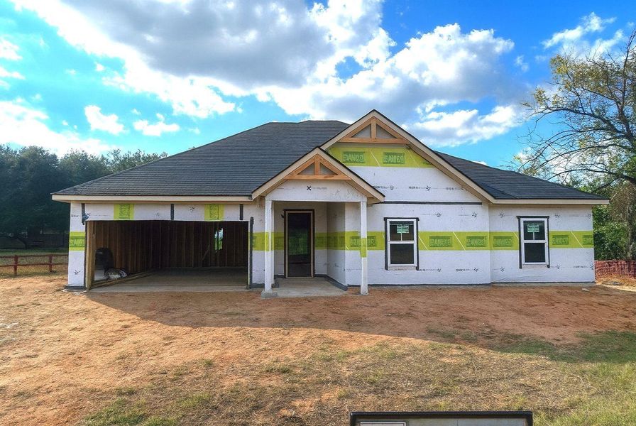 Exterior details and patio area of a home in , Willis (Image 1). Exterior details and patio area of a home in , Willis (Image 1).