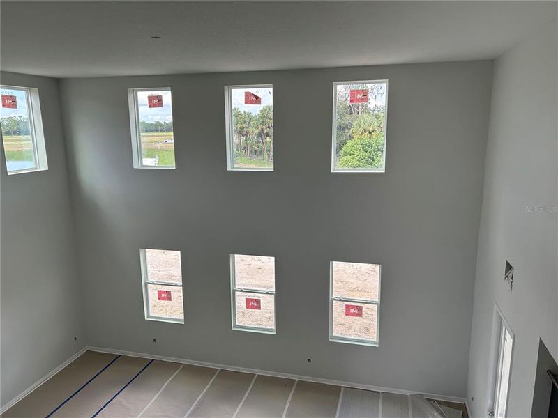 In-progress construction of a new home in Oakfield Trails Signature, Parrish, FL (Image 9).