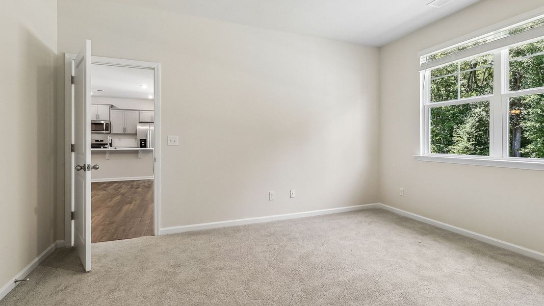 Spacious, unfurnished interior of a new home in Sease's Pond, Gilbert (Image 16).
