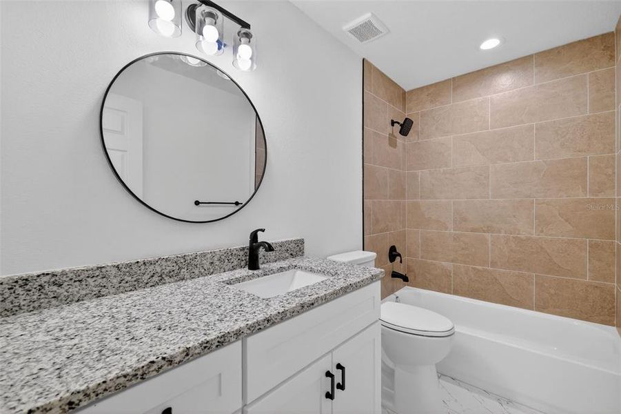 Furnished interior view inside a new home in , Dunnellon (Image 6).