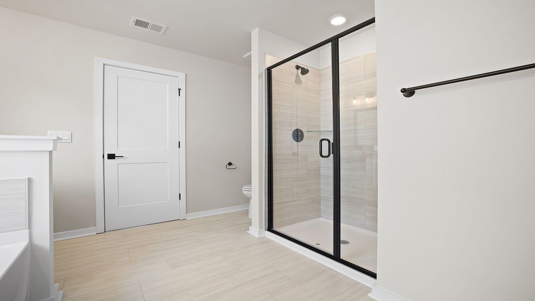 Representative furnished interior of a home built from the BERKSHIRE by D.R. Horton in Sycamore Cove, Woodruff (Image 12).