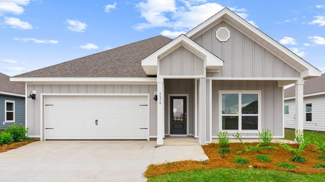 Front exterior of a new home in Hodges Bayou Plantation, Panama City, FL, highlighting curb appeal (Image 1). Front exterior of a new home in Hodges Bayou Plantation, Panama City, FL, highlighting curb appeal (Image 1).