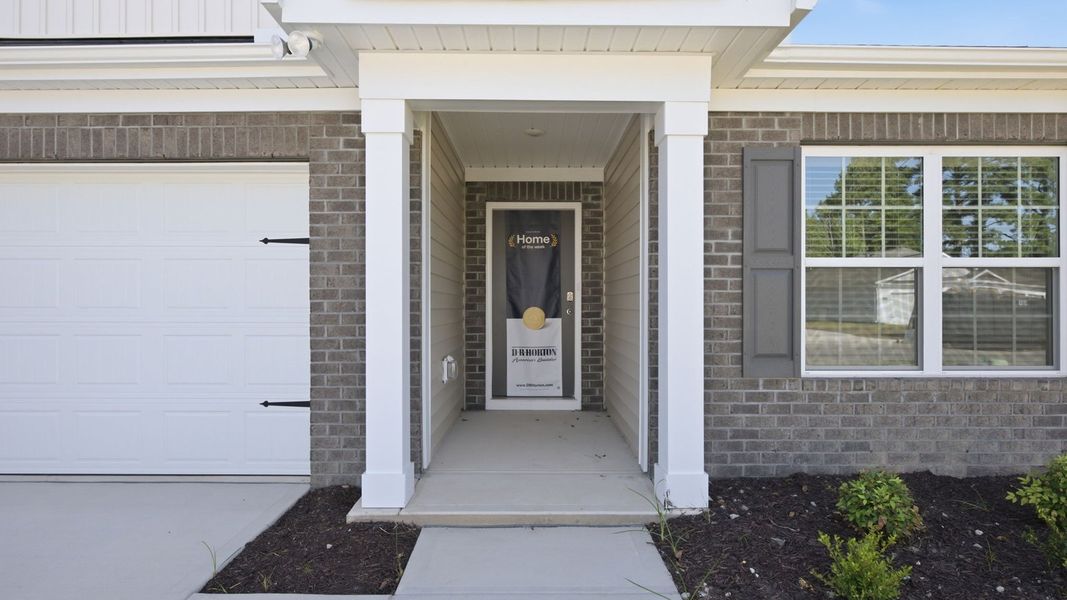 Exterior details and patio area of a home in Madeline Farm, New Bern (Image 3).