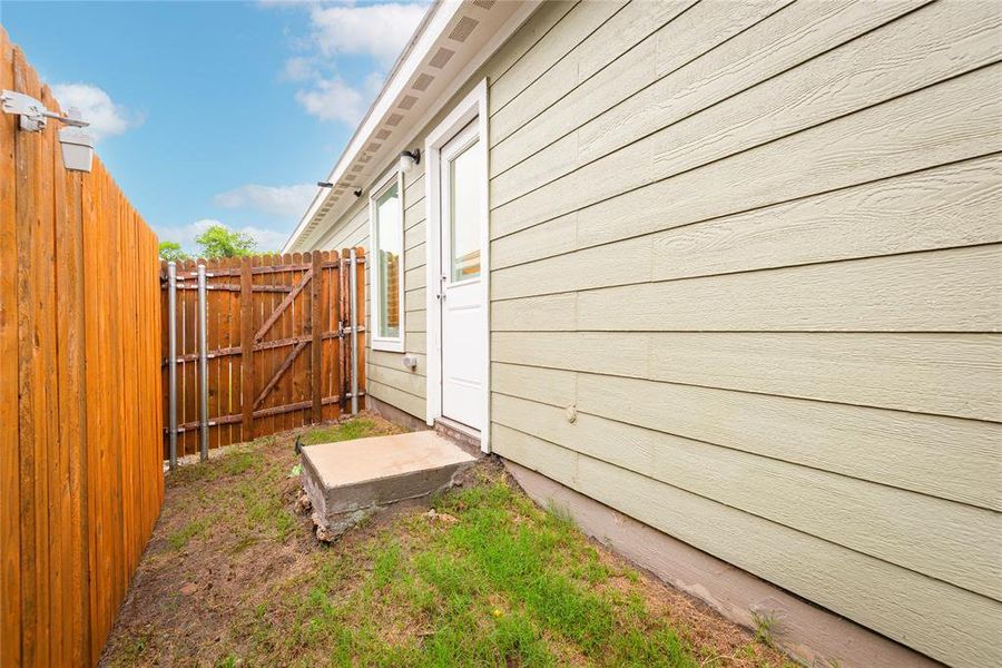Exterior details and patio area of a home in Tillage Farms, Princeton (Image 22).
