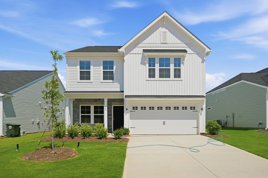Front exterior of a new home in Piper Creek, Newton, NC, highlighting curb appeal (Image 1). Front exterior of a new home in Piper Creek, Newton, NC, highlighting curb appeal (Image 1).