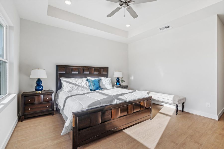 Clean wall lines and steady natural light from the side window keep the primary suite feeling open and relaxed rather than closed off. Clean wall lines and steady natural light from the side window keep the primary suite feeling open and relaxed rather than closed off.