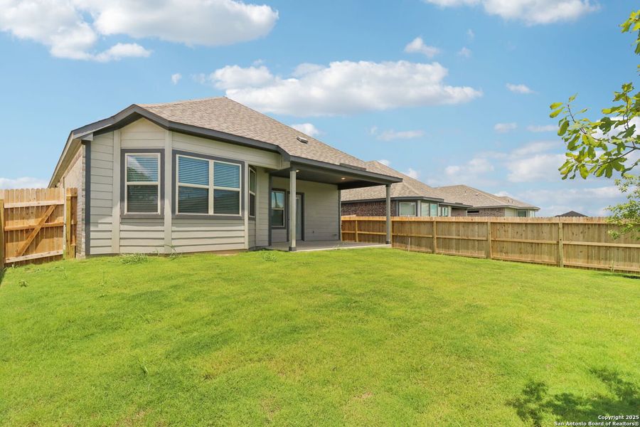 Front exterior of a new home in Kallison Ranch, San Antonio, TX, highlighting curb appeal (Image 16).
