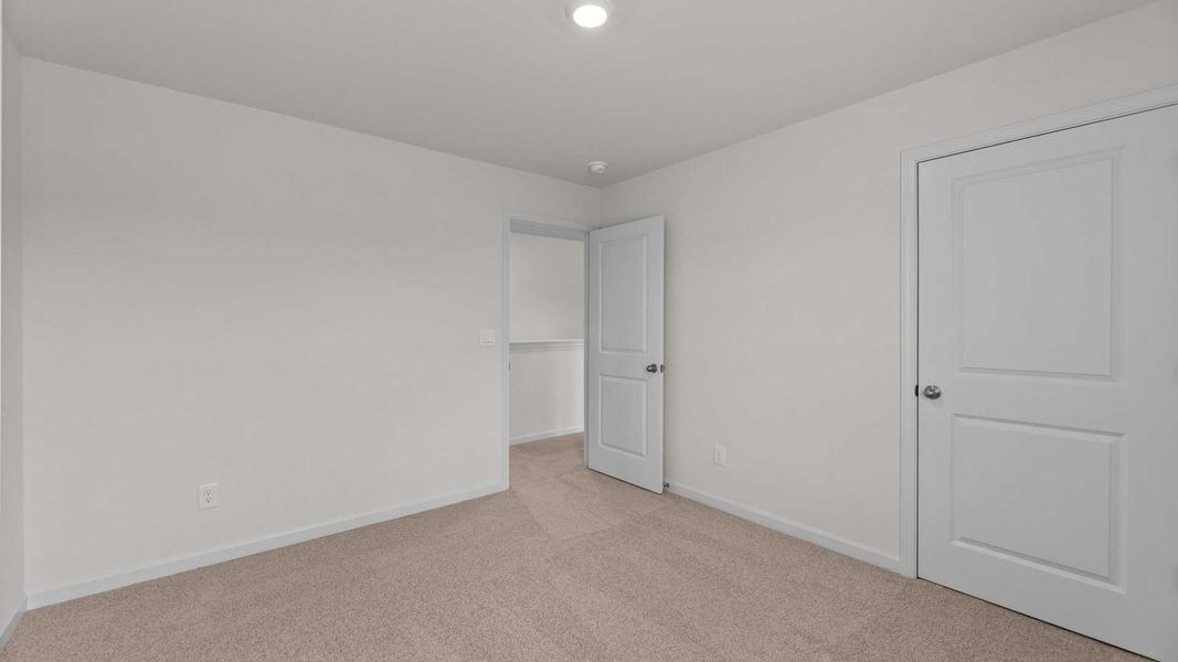 Spacious, unfurnished interior of a new home in Beaver Dam Crossing, Bailey (Image 21).
