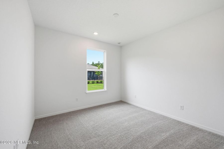 Spacious, unfurnished interior of a new home in Del Webb Wildlight, Yulee (Image 13).