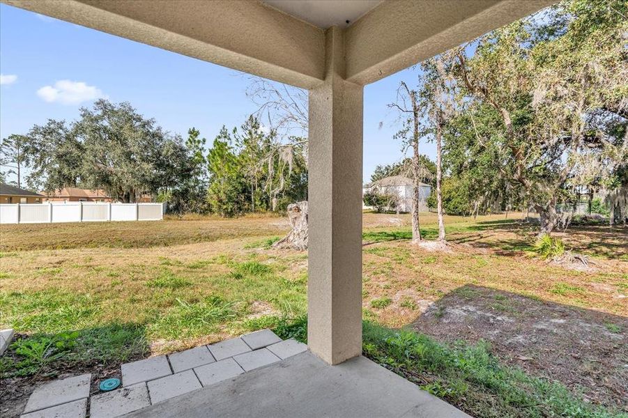 Exterior details and patio area of a home in Poinciana Village, Kissimmee (Image 16).