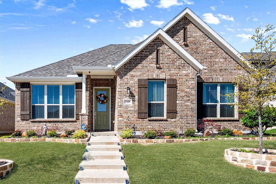 Front exterior of a new home in Dove Hollow, Waxahachie, TX, highlighting curb appeal (Image 19).