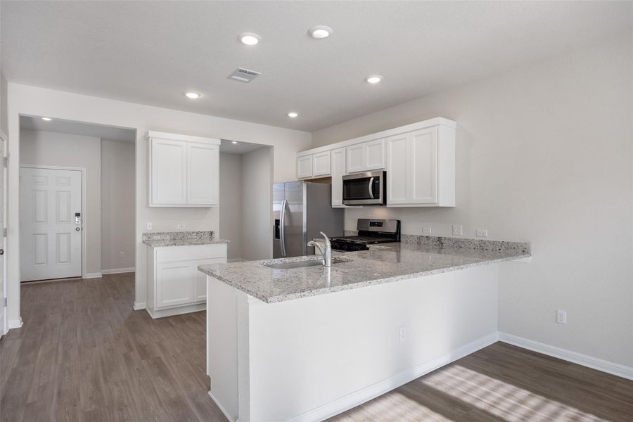 Furnished interior view inside a new home in Avery Centre, Round Rock (Image 7).