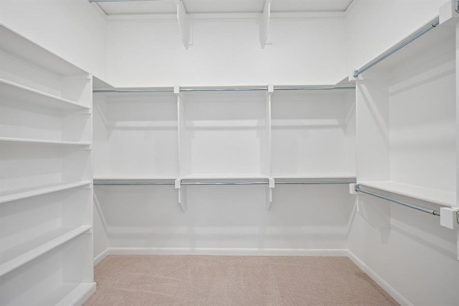 With ample space and seasonal storage, this owner's closet is everything you have dreamed of!