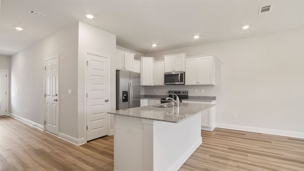 Representative furnished interior of a home built from the Palm Interior by D.R. Horton in Caballeros Estates Townhomes at Hombre, Panama City Beach (Image 6). Representative furnished interior of a home built from the Palm Interior by D.R. Horton in Caballeros Estates Townhomes at Hombre, Panama City Beach (Image 6).