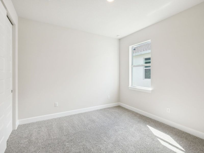 Bedroom in the Bergamo floorplan at 11306 NW Firefly Court