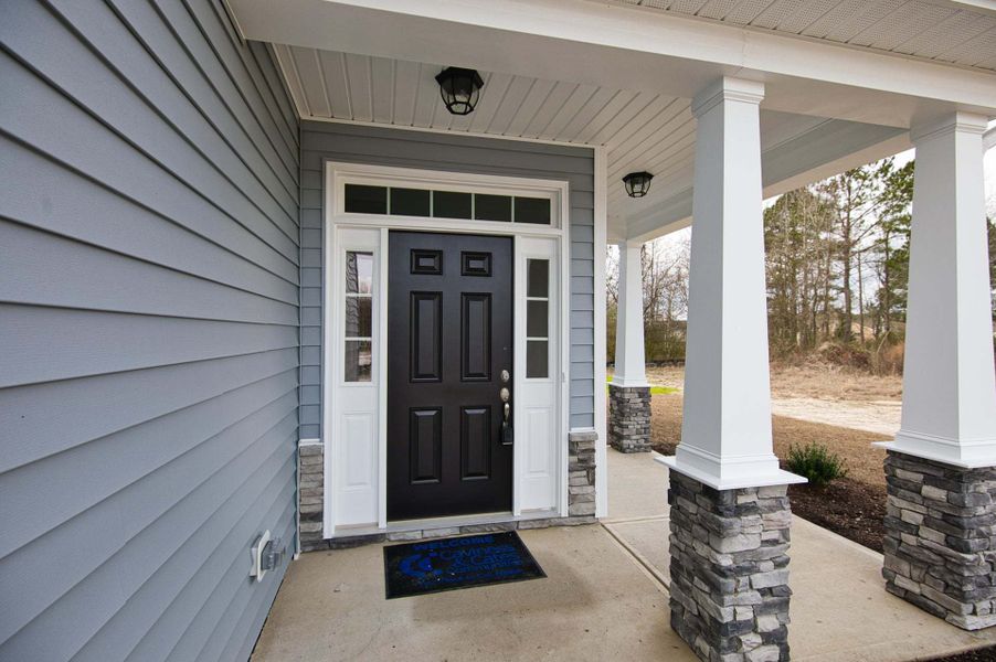 Representative exterior photo of a completed home built from the Springfield by Caviness & Cates Communities in Sutherland Station at Olde Liberty, Franklinton, NC (Image 80). Representative exterior photo of a completed home built from the Springfield by Caviness & Cates Communities in Sutherland Station at Olde Liberty, Franklinton, NC (Image 80).