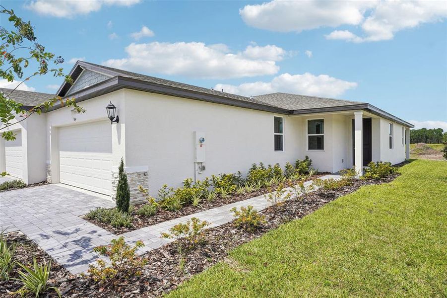 Exterior details and patio area of a home in Ridgehaven - Villas, Ormond Beach (Image 18).