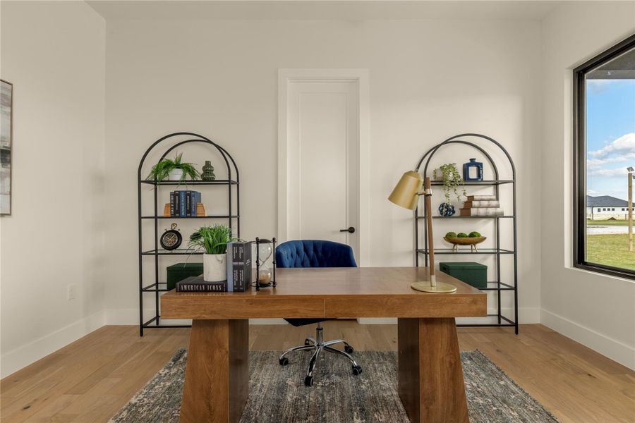 Office area with light wood finished floors