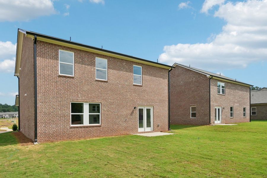 Representative exterior details of a home built from the Radiance by Starlight Homes in Kendall Grove, McDonough (Image 4). Representative exterior details of a home built from the Radiance by Starlight Homes in Kendall Grove, McDonough (Image 4).