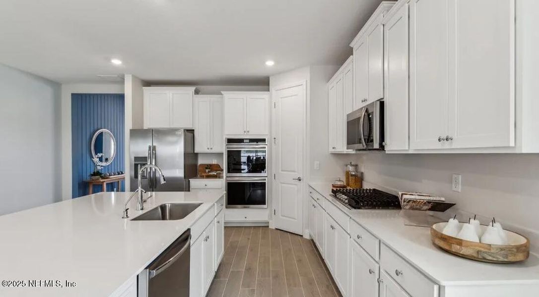 Furnished interior view inside a new home in Silver Meadows at SilverLeaf: Silver Meadows 50s, St. Augustine (Image 8).