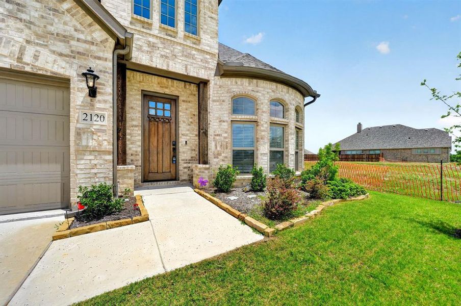 Exterior details and patio area of a home in Stone River Glen, Royse City (Image 4). Exterior details and patio area of a home in Stone River Glen, Royse City (Image 4).