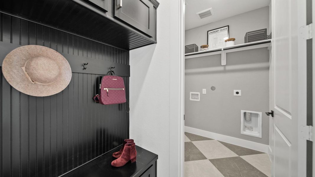 Throw off your shoes, backpacks, purses and accessories because this utility room leads into a reliable mud room! Exquisite upper and lower cabinetry also give you space to hide all those accessories. There can be no evidence that anyone actually lives here, right? Throw off your shoes, backpacks, purses and accessories because this utility room leads into a reliable mud room! Exquisite upper and lower cabinetry also give you space to hide all those accessories. There can be no evidence that anyone actually lives here, right?