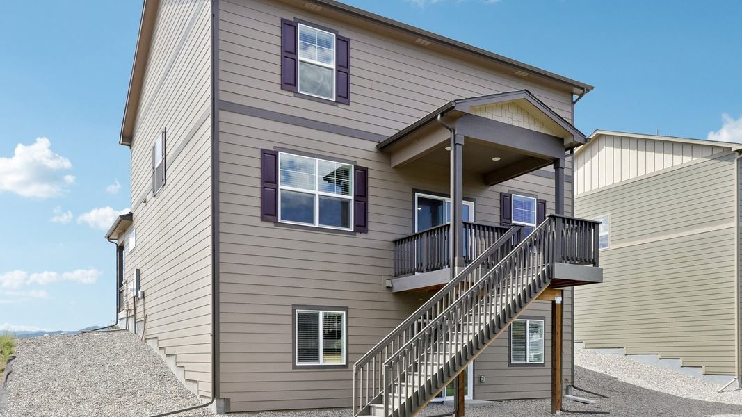 Exterior details and patio area of a home in Vantage, Berthoud (Image 18).