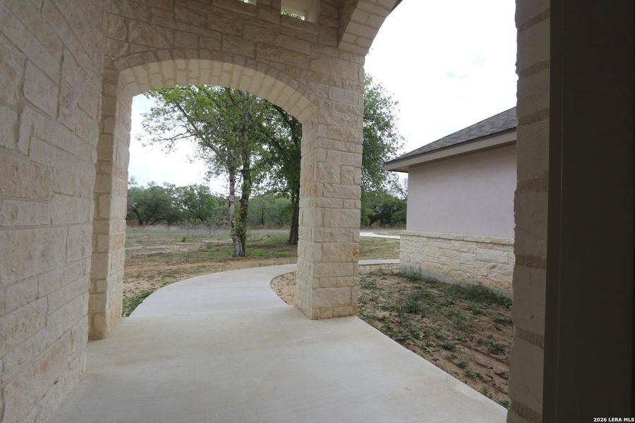 Exterior details and patio area of a home in , Floresville (Image 3).