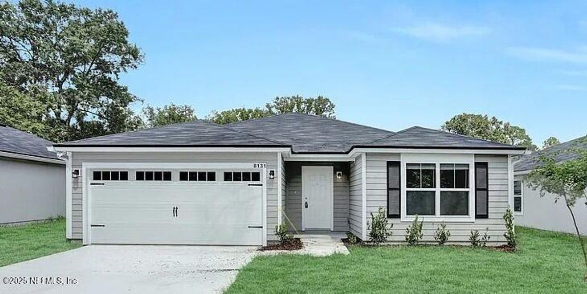 Front exterior of a new home in , Jacksonville, FL, highlighting curb appeal (Image 1). Front exterior of a new home in , Jacksonville, FL, highlighting curb appeal (Image 1).