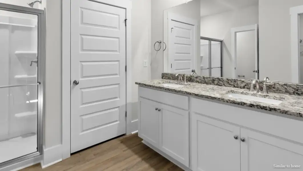 Furnished interior view inside a new home in The Highlands at Cedar Hill Landing, Navassa (Image 11).