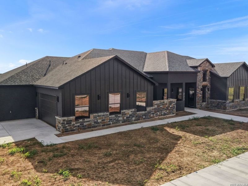 Front exterior of a new home in , Seguin, TX, highlighting curb appeal (Image 2). Front exterior of a new home in , Seguin, TX, highlighting curb appeal (Image 2).