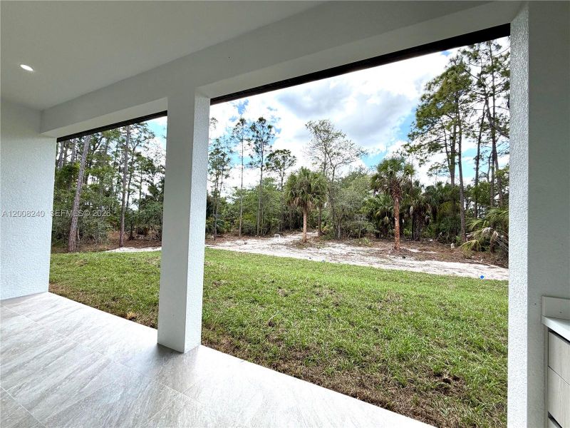 Exterior details and patio area of a home in , Naples (Image 4).