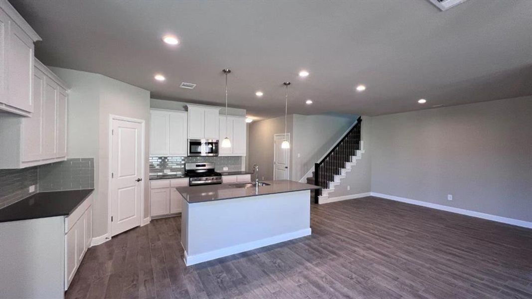 Kitchen - All Home and community information, including pricing, included features, terms, availability and amenities, are subject to change at any time without notice or obligation. All Drawings, pictures, photographs, video, square footages, floor plans, elevations, features, colors and sizes are approximate for illustration purposes only and will vary from the homes as built. Kitchen - All Home and community information, including pricing, included features, terms, availability and amenities, are subject to change at any time without notice or obligation. All Drawings, pictures, photographs, video, square footages, floor plans, elevations, features, colors and sizes are approximate for illustration purposes only and will vary from the homes as built.