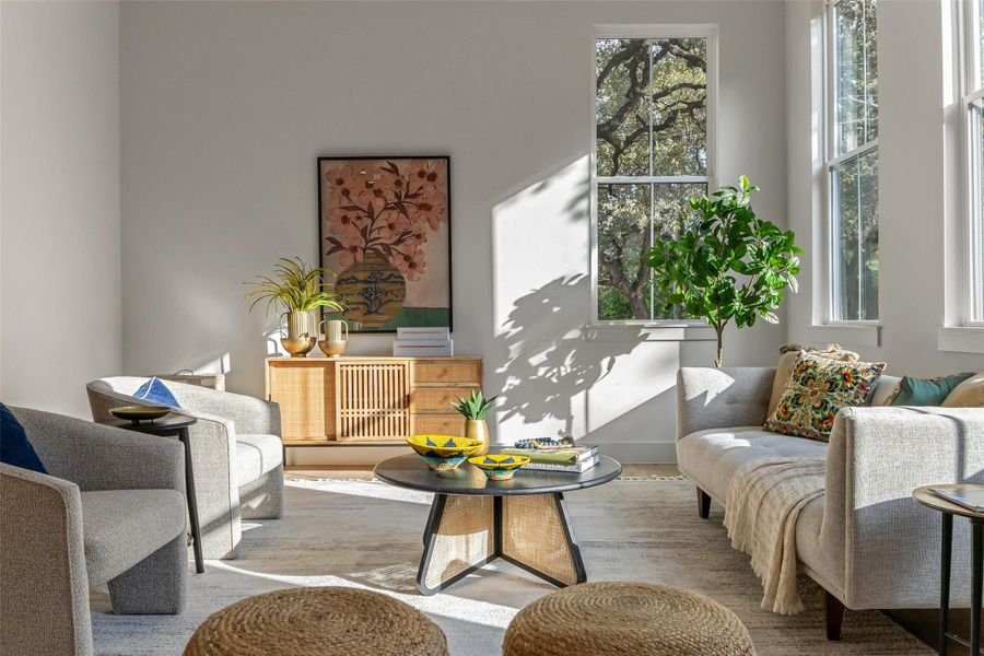 Living room with light wood-type flooring